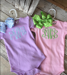 Body suit with large monogram